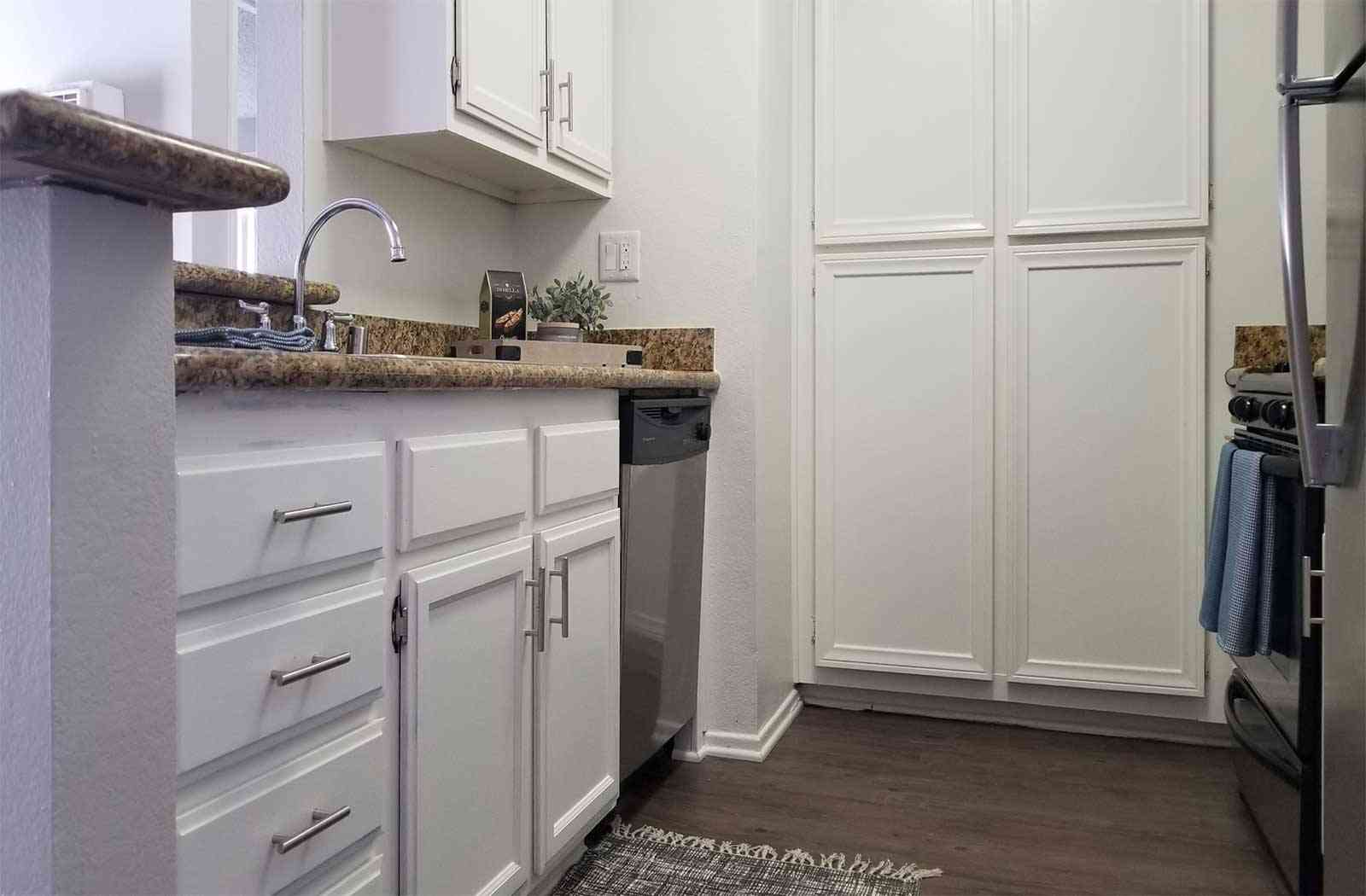 modern kitchen layout with built in dishwasher